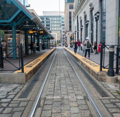Jersey,City,,Nj,United,States,-,August,27,2024:,Hudson photo of a train station from the perspective of the traintracks, pedestrians on either side waiting for their train to arrive.